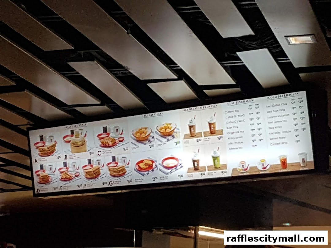A menu board displaying various set meals, ice blended drinks, hot and cold beverages.