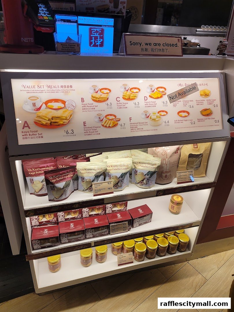A display of Ya Kun Kaya Toast value set meals and packaged food items.
