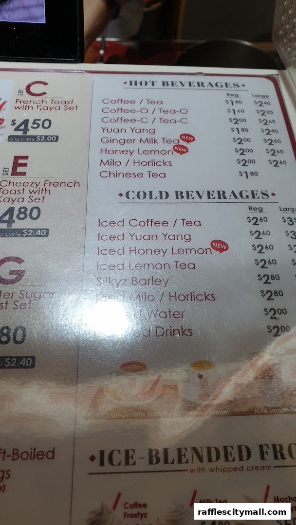A menu from Ya Kun Kaya Toast featuring hot and cold beverages, and ice-blended drinks.