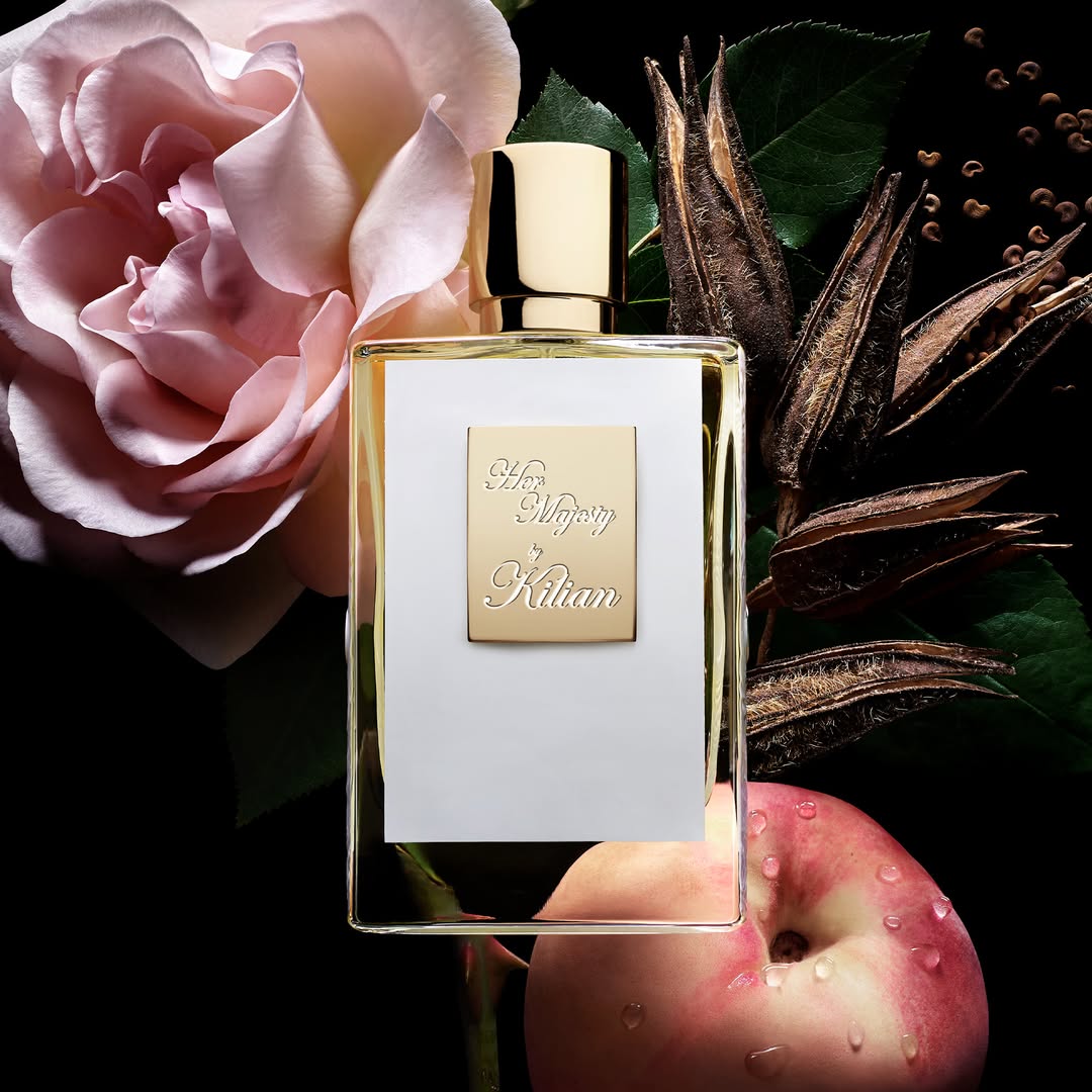 A luxurious bottle of Her Majesty by KILIAN PARIS showcased in an elegant setting.