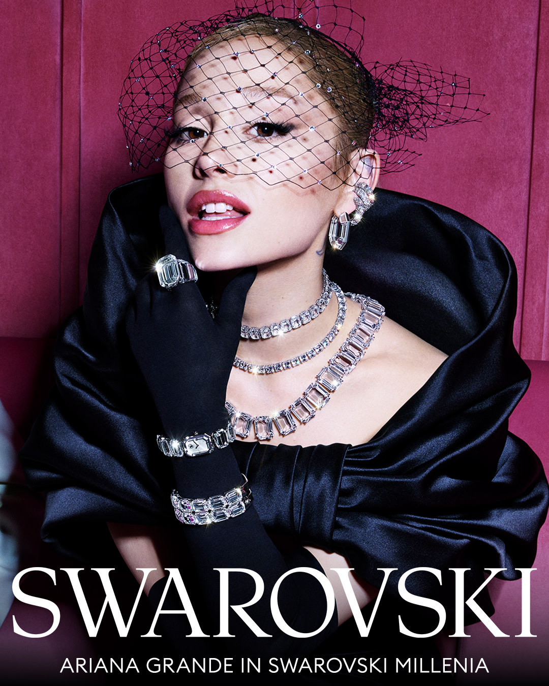 Ariana Grande elegantly adorned with sparkling Swarovski jewelry, embodying holiday glamour for the 'Party of Dreams' campaign.