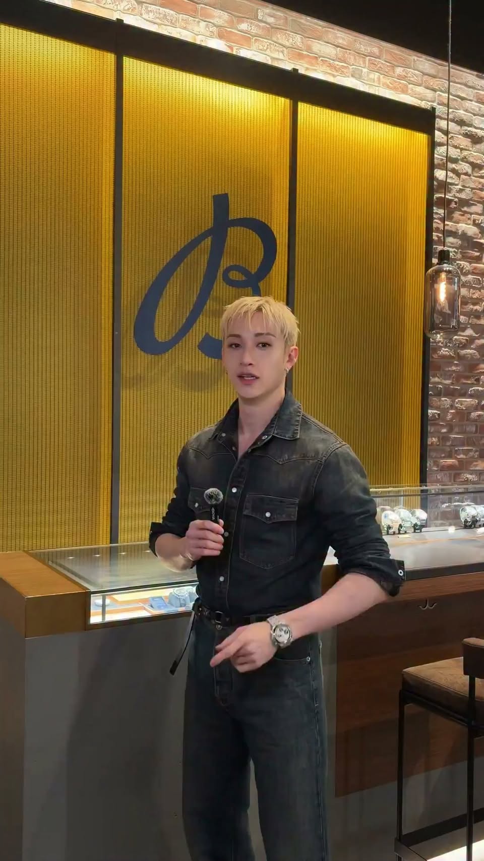 Bang Chan at Breitling F1 Pop-Up