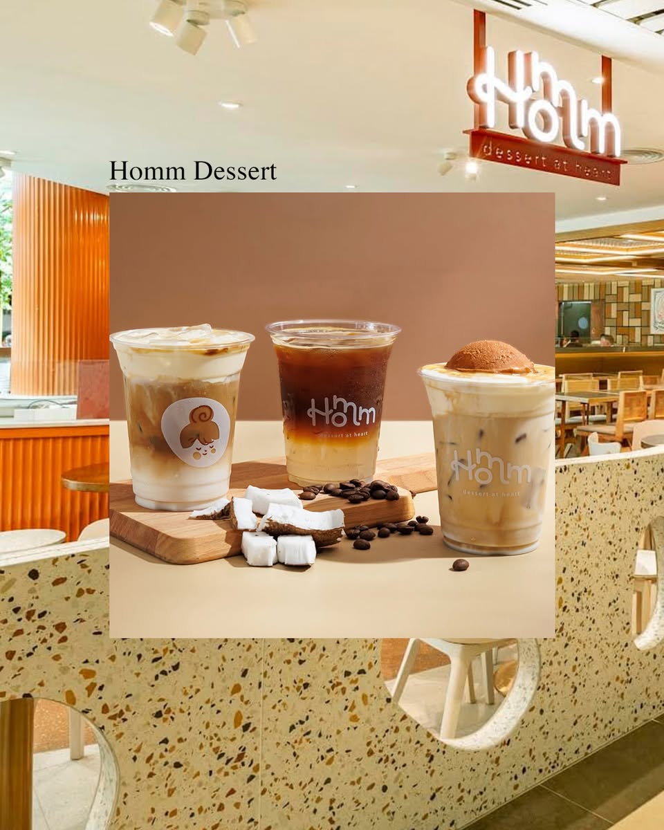 Patrons enjoying their coffee in a chic cafe environment.