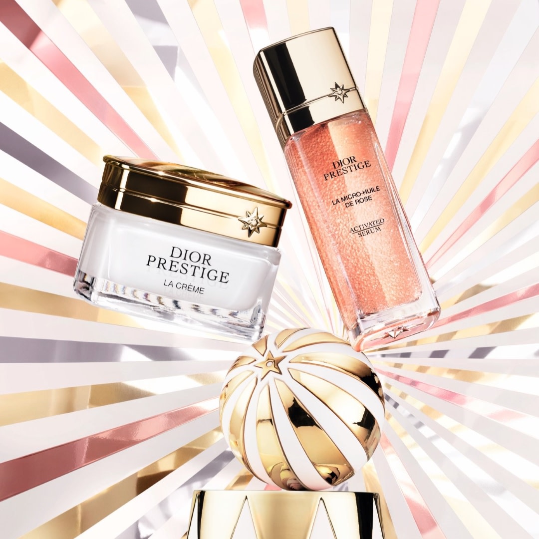 Close-up of a Dior product, possibly a fragrance or cosmetic, part of a festive collection.